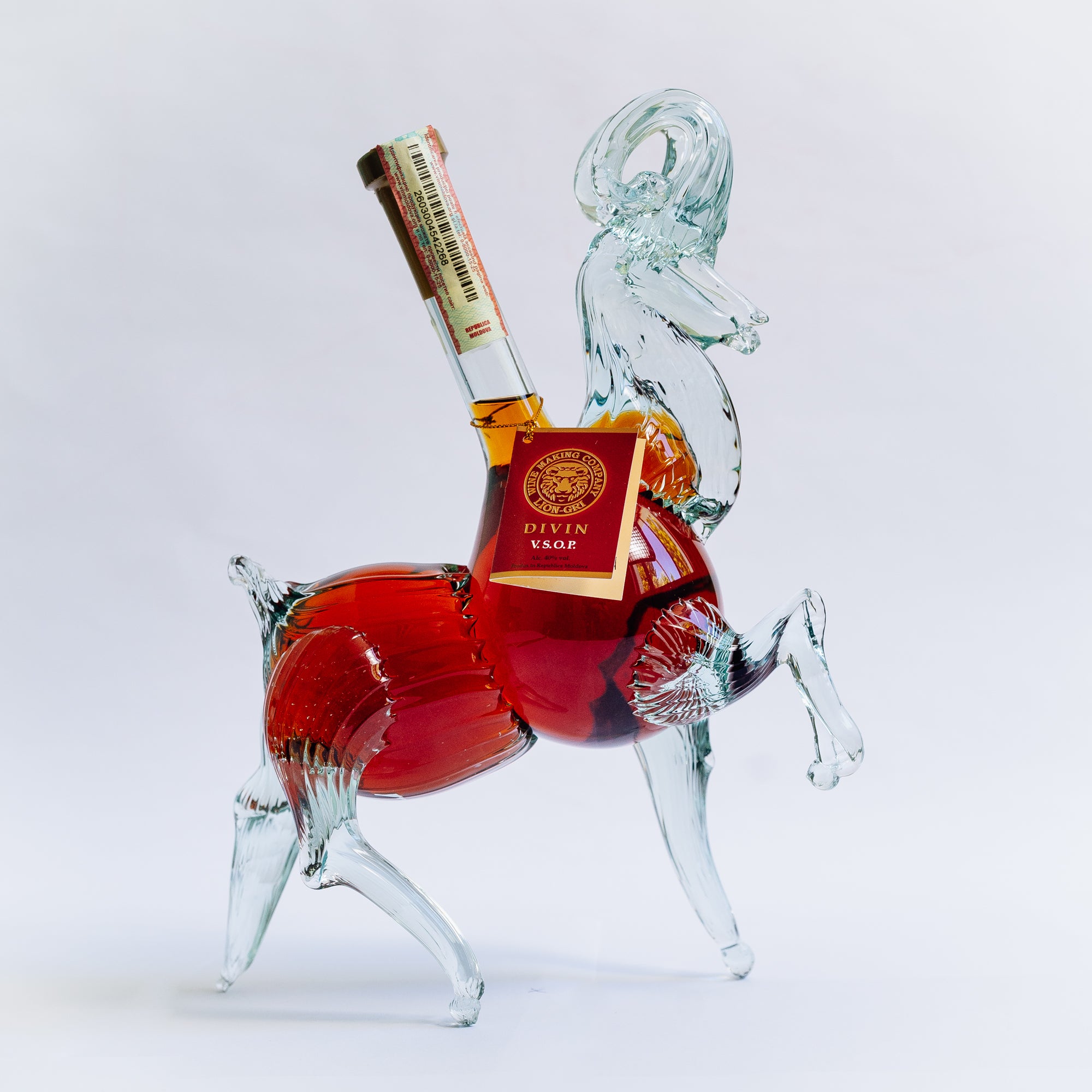 Divin VSOP Berbec 500ml în sticlă decorativă transparentă Lion-gri, culoare chihlimbar.