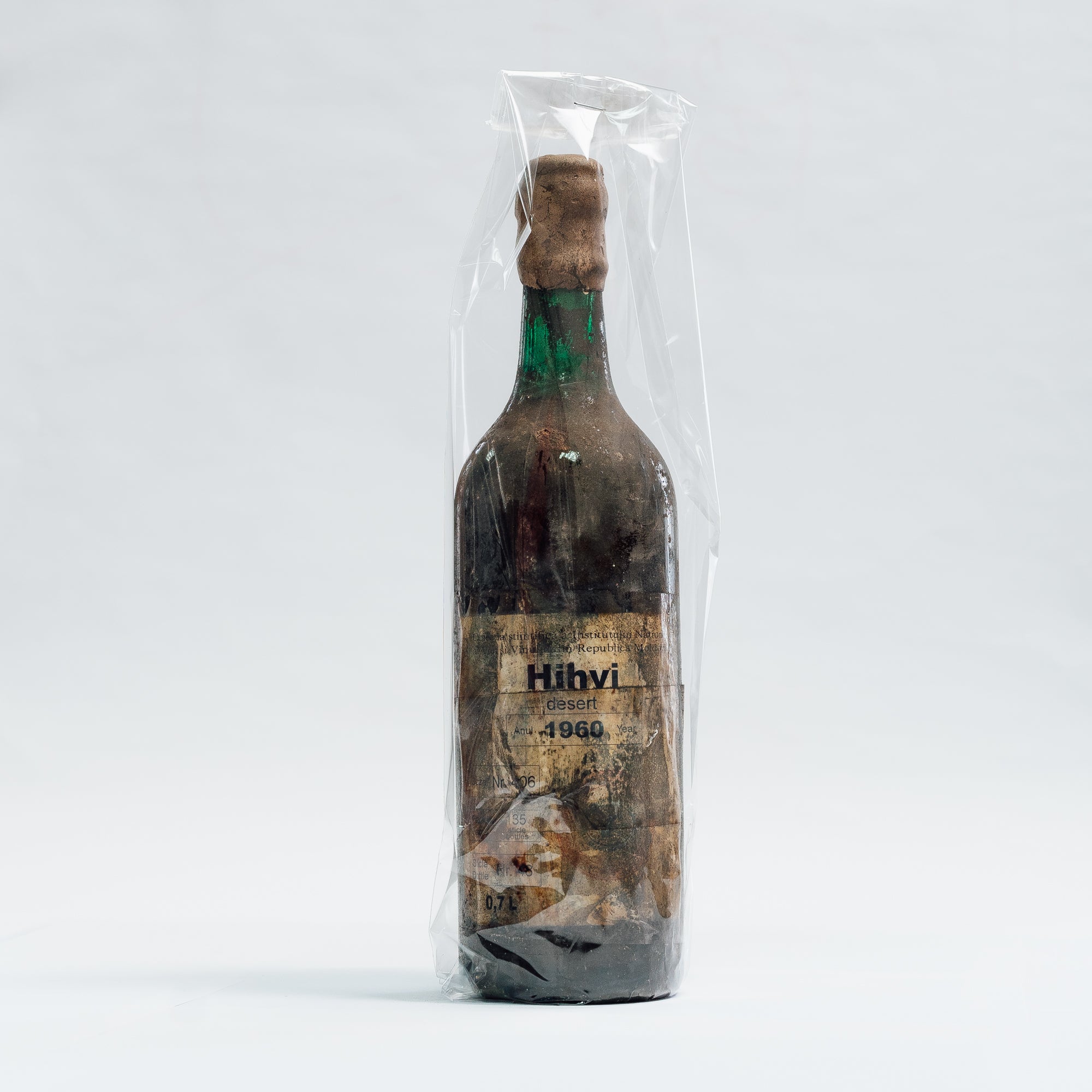 Vin de colecție desert HihVi 1960 Lion-gri, sticlă verde, etichetă veche.