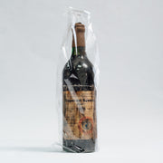 Sticlă vin Saperavi Severnii Desert 1975, brand Lion-gri, ambalată în folie transparentă.