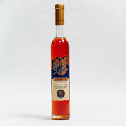 Sticlă Traminer Late Harvest Lion-gri 350 ml cu etichetă elegantă, design auriu și dop auriu.